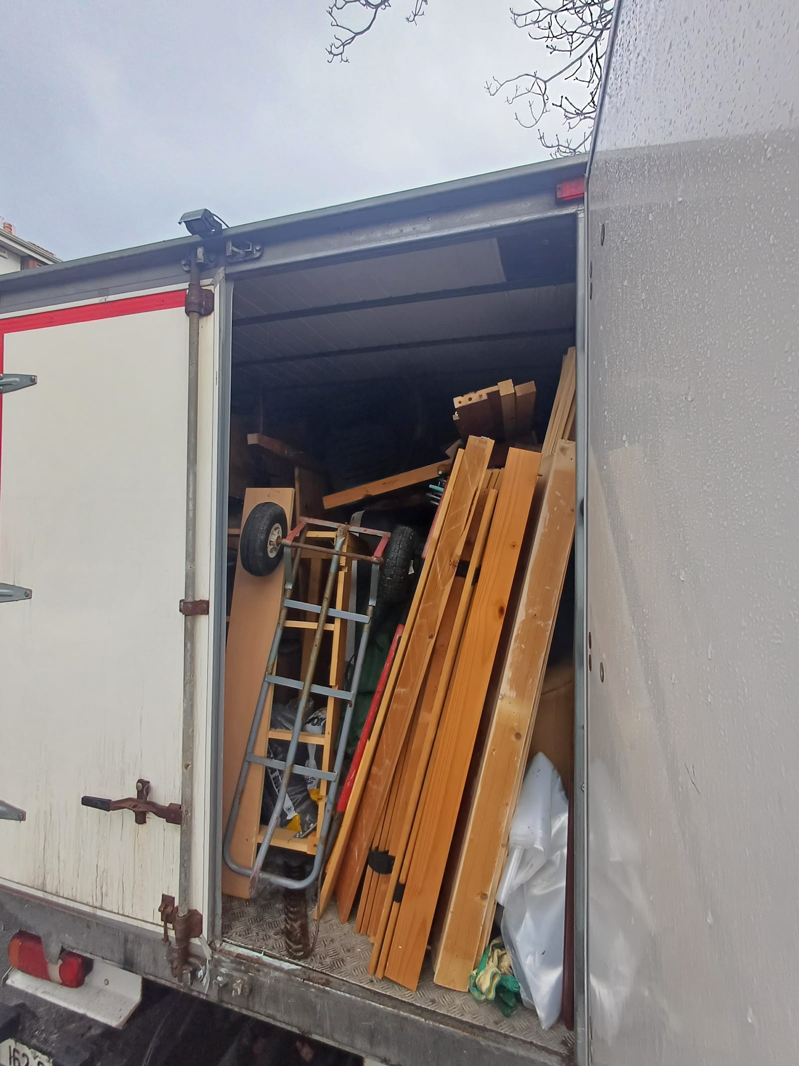 Timber and household items loaded into the clearance van